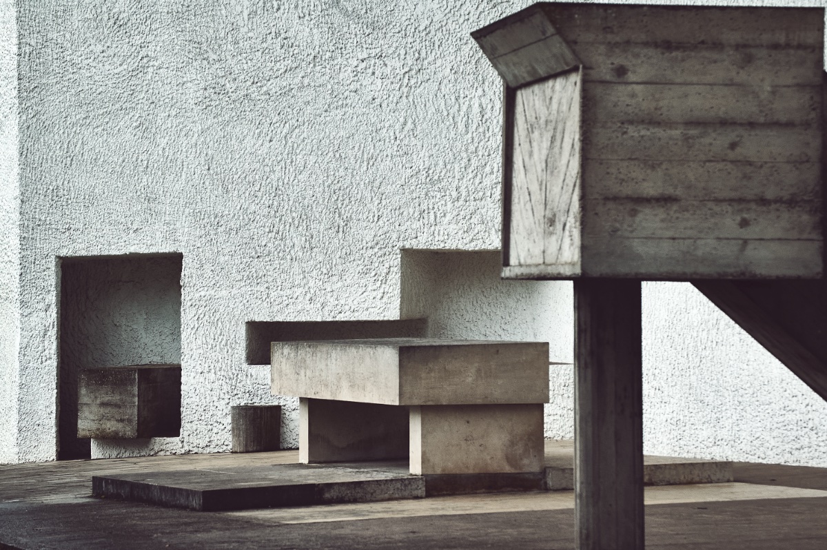 Geometry entering real space, where plastic forms begin to challenge the abstraction of the drawing.
